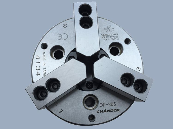 如何確認(rèn)車床上使用中實(shí)卡盤還是中空卡盤?